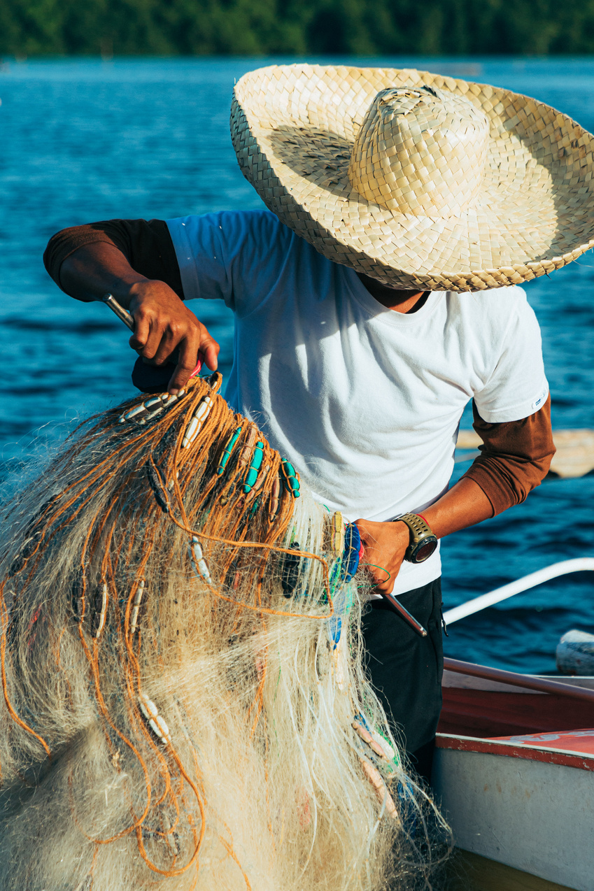 Fisherman Casting a Net